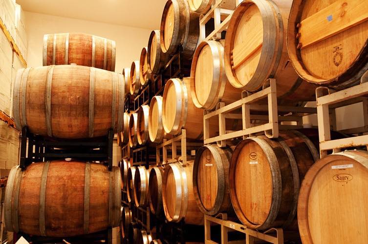 Barrels of wine in a winery