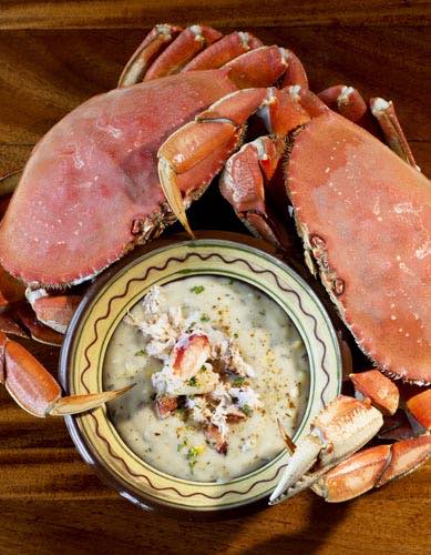 Crabs with a bowl of crab chowder